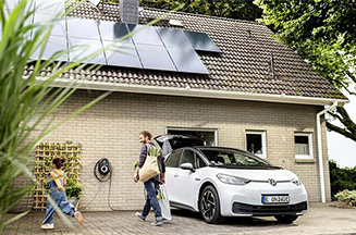 house with solar panels and EV charger