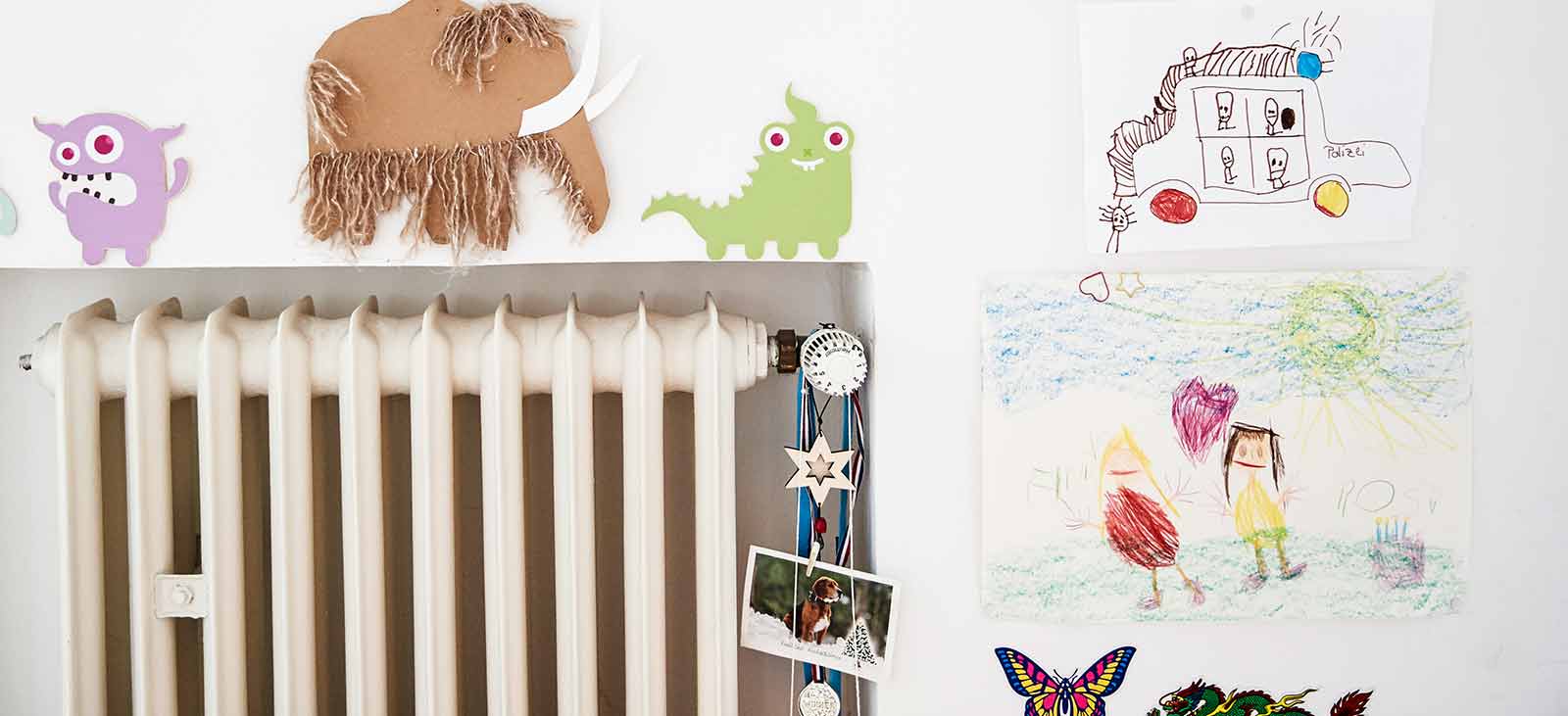 radiator with childs paintings