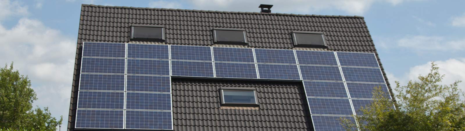Image of a house roof with solar panels