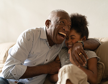 Image of a grandfather with his granddaughter