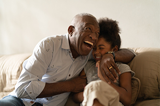 Image of a grandfather with his granddaughter