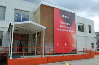 Exterior of E.ON's new training academy including electric van parked outside